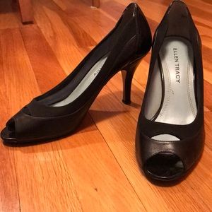 Black leather peekaboo toe heels